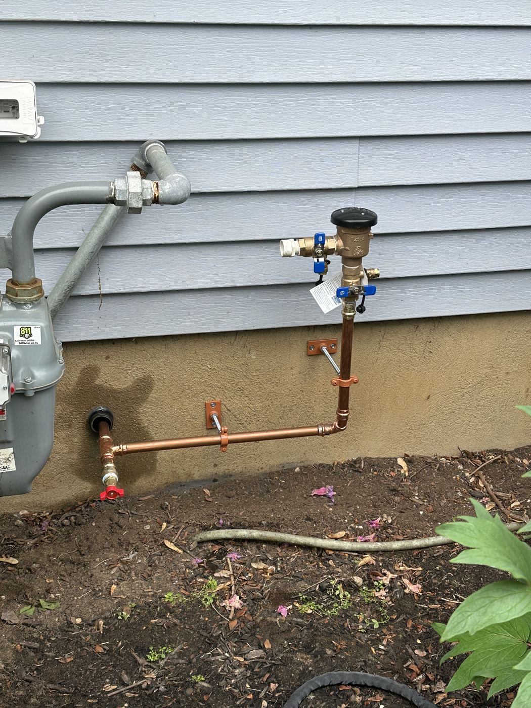 Exterior backflow preventer with new copper piping