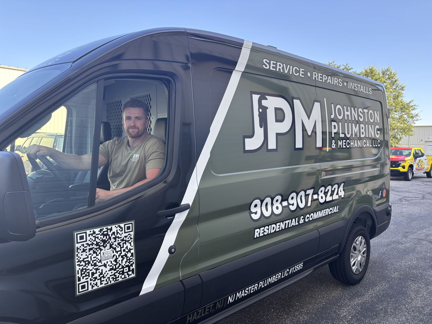 Chris Johnston in the driver's seat of the JPM van