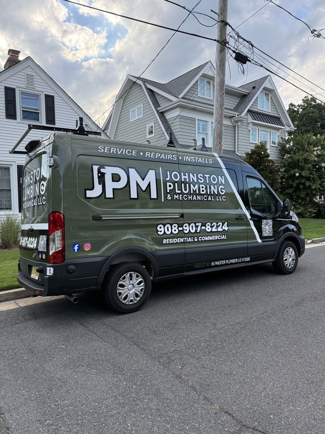 JPM van parked on a residential street