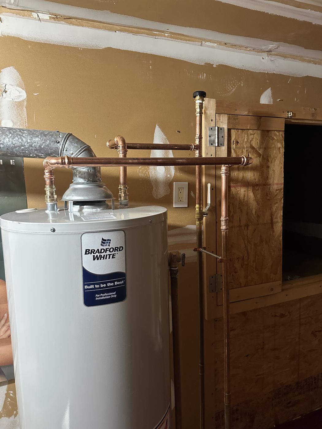 New Bradford White gas water heater with copper piping