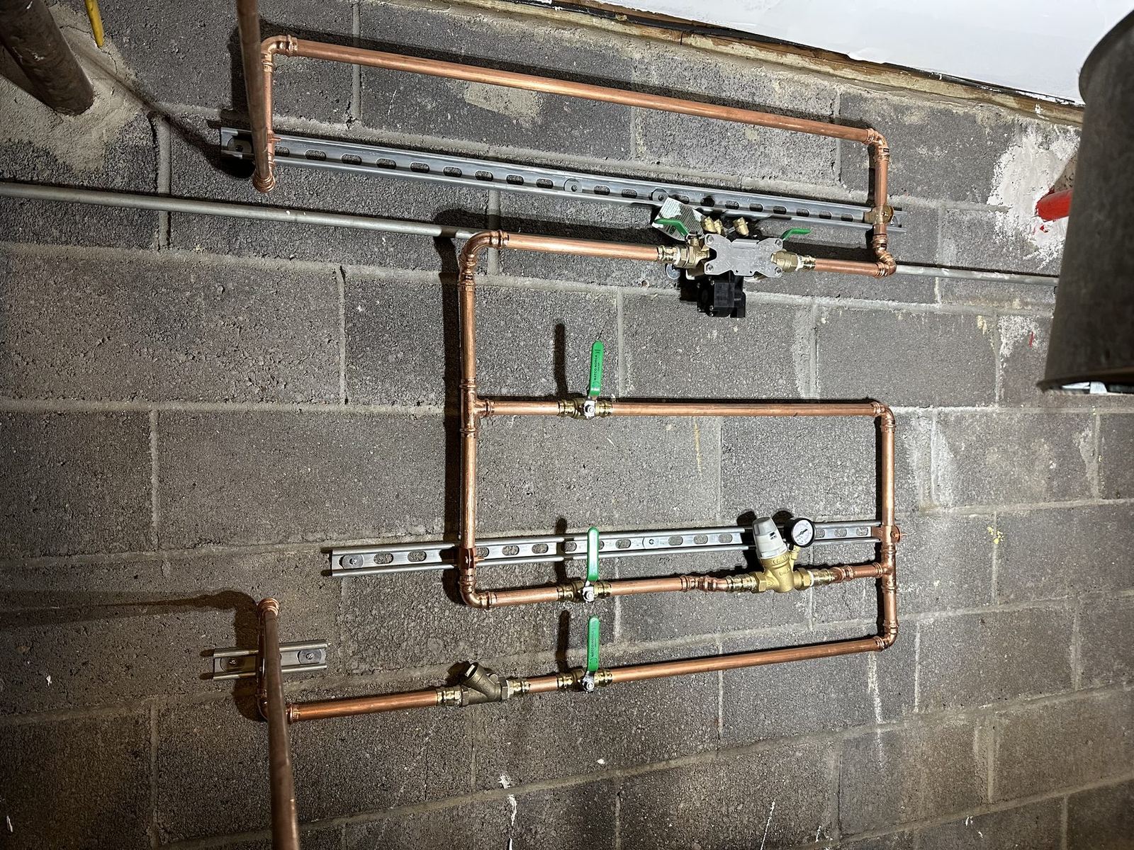 New copper boiler feed with backflow preventer, pressure reducing valve, gauge and strainer on strut